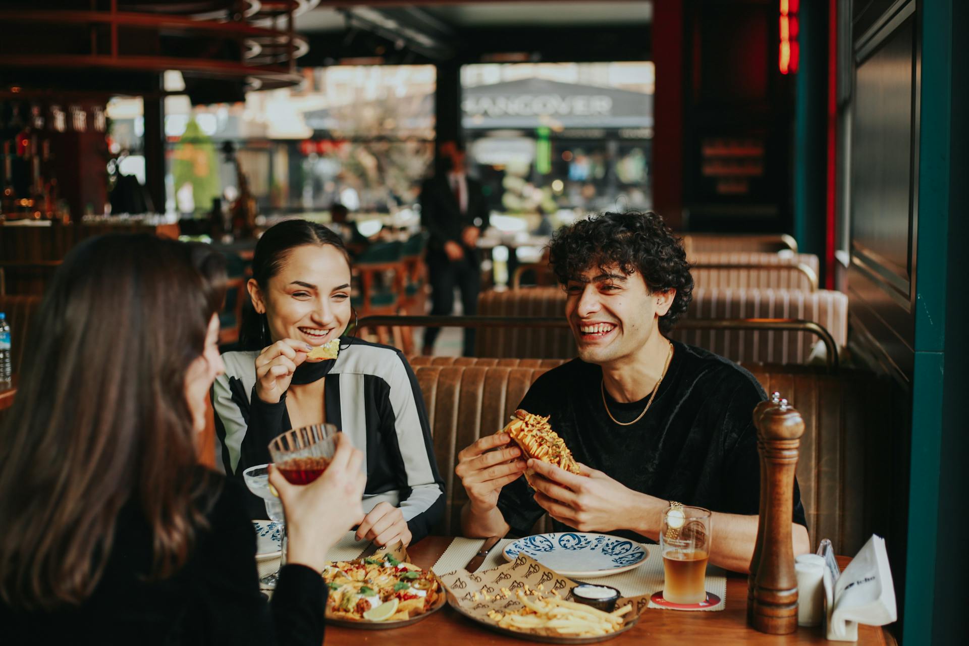 Group of friends splitting a restaurant bill evenly
